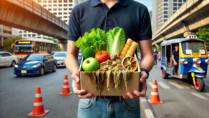 A man holding a box of vegetables